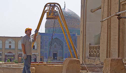 Amin Adili at a restoration project in Naqsh-e Jahan Square amin-adili-restoration-expert-at-naqsh-e-jahan-square-isfahan-iran-historical-conservation-project-cultural-heritage