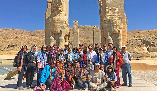 Thai travelers with Amin at Persepolis, Iran amin-adili-jeytravel-tour-guide-with-thai-travelers-visiting-persepolis-iran-ancient-persian-heritage-cultural-tour